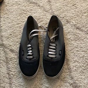 Black and grey low top vans